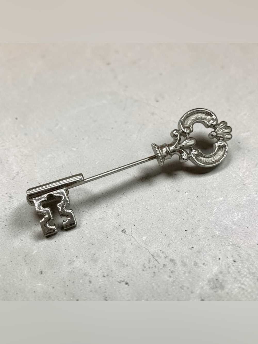 Vintage Avon 1978 “Fashion Keynote” Silver Ornate Skeleton Key Brooch